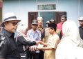 Bupati Salurkan Sembako Pada Korban Kebakaran di Koto Baru
