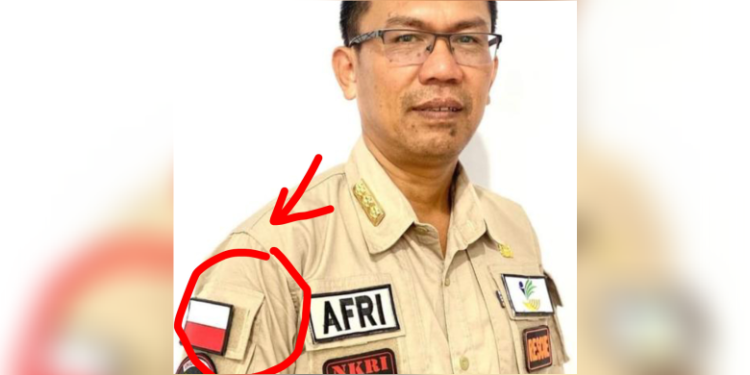 Kadisdik Limapuluh Kota Pasang Bendera Terbalik di Lengan Baju, Ini Aturannya