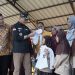 Penuhi Janji, Pemkab Limapuluh Kota Serahkan 11.931 Paket Bantuan Seragam Sekolah SD dan SMP