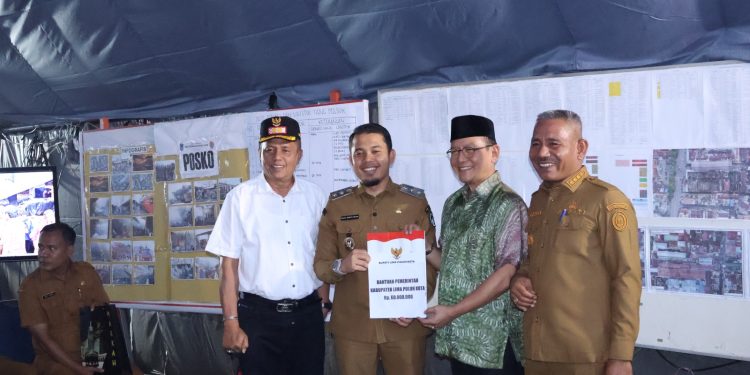 Pemko Bukittinggi Dan Pemkab 50 Kota Serahkan Bantuan Musibah Kebakaran Di Kota Payakumbuh